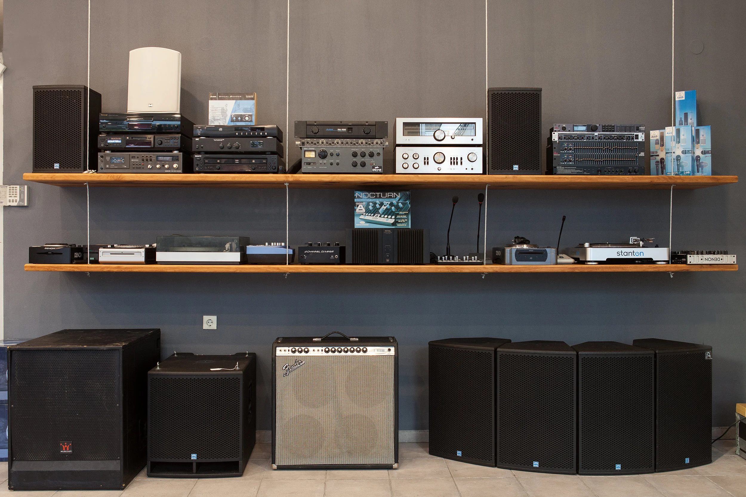 An image showing various audio equipment racks.